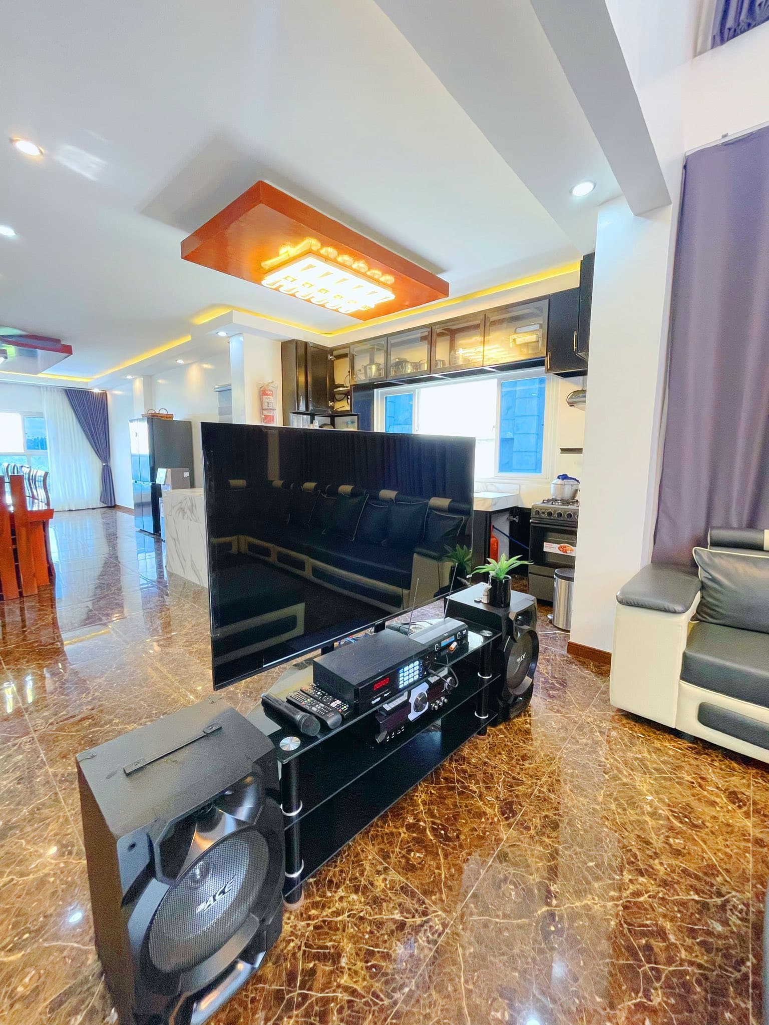 The shared lounge with smart TV and sound system